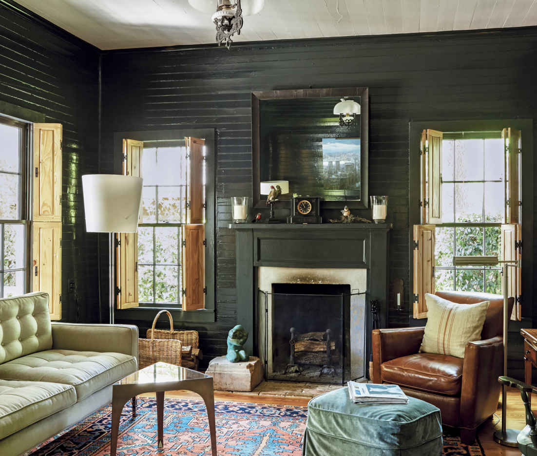 UNLIKELY INSPIRATIONS. It’s always smart to steal design notes from a favorite restaurant or bar. The idea to paint these walls such a deep, dark, glossy shade came from a small East Coast pub the homeowners once visited.