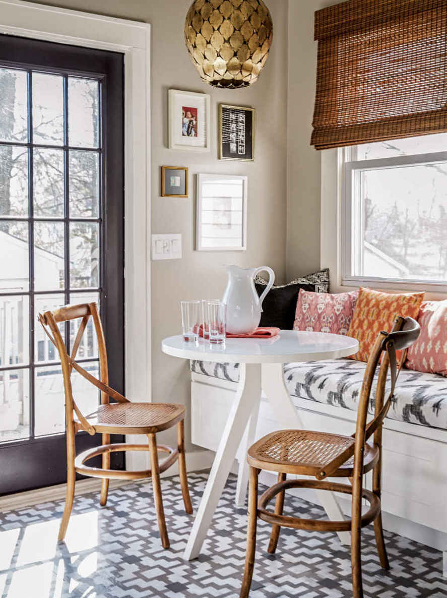 FOLLOW THE LITTLE BLACK LINE. Painting these French doors a crisp black pulls your eye straight to the corner retreat, creating a rich layer that (again) helps to visually separate the space.