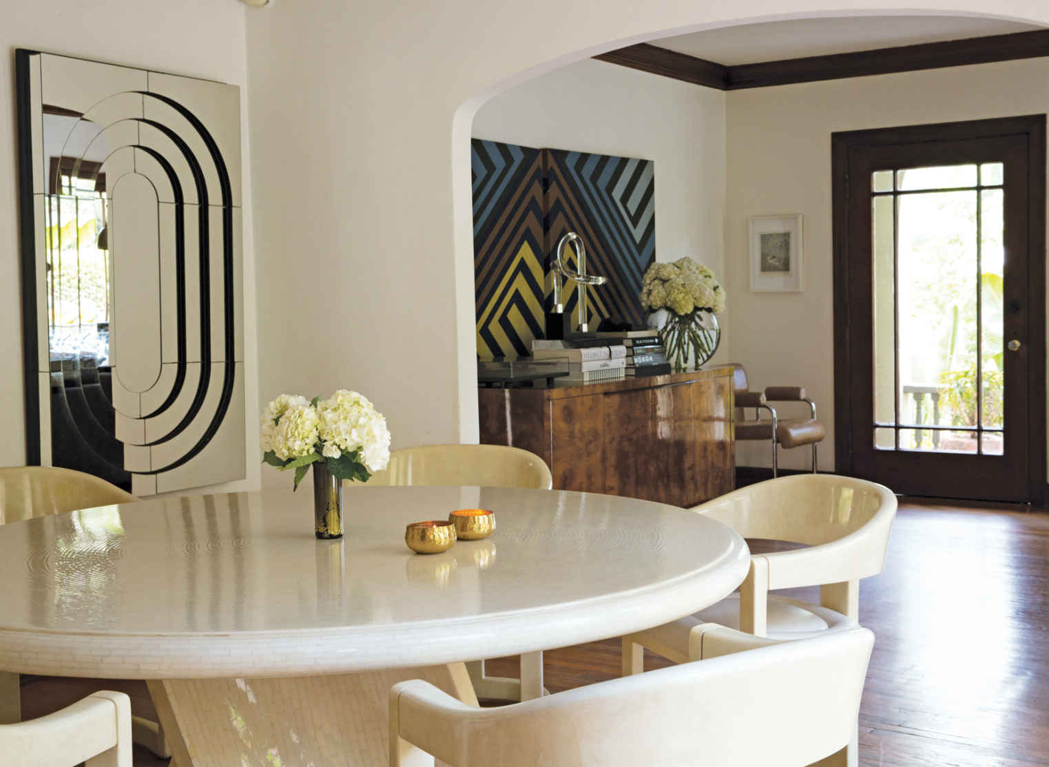 SOME PEOPLE HAVE ALL THE LUCK! Karl Springer was a furniture designer in the seventies and eighties, famous for his use of exotic materials. Today, his work is hard—and expensive—to come by. Laura found these Springer chairs for a steal at the Rose Bowl Flea Market.