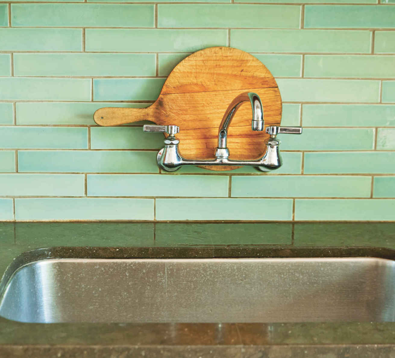 BACKSPLASH BARGAINS. This thrifty couple trekked all the way to Sausalito, California, to shop the “overstock” selection at Heath Ceramics, their dream tile source. If your design is flexible, most tile stores have a discount section where great deals can be found.