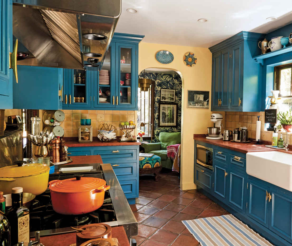 COOKING UP A STORM. With a six-burner commercial stove and baker-grade oven, this comfortable kitchen can cook for a lot more than one family. Having that type of fire power costs more but is money well spent for the ambitious home chef.