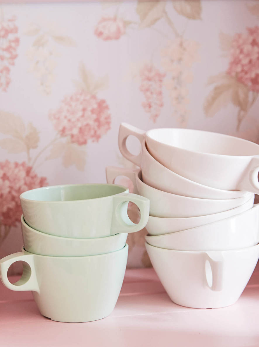 THE SWEETEST DETAILS. Antique wallpaper was added as a backdrop to the hutch; a simple detail that really delivers.