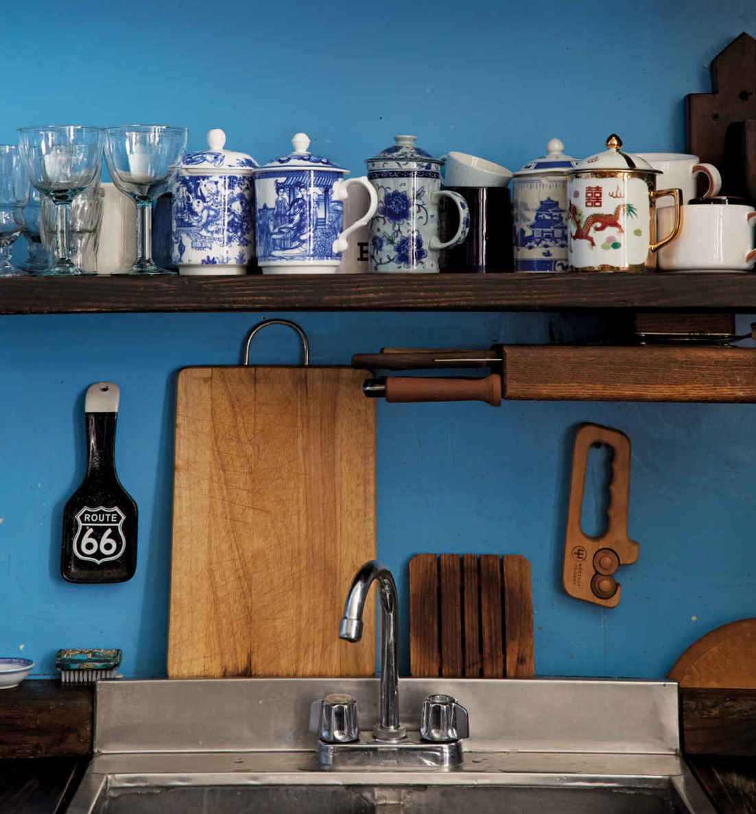 THE PERFECT SHADE. When you fall in love with a paint color, it’s a hard thing to let go of. This vibrant blue (Benjamin Moore “Blue Belle”) is a holdover from Michele’s previous kitchen—and according to her, will be in all of her kitchens to come.