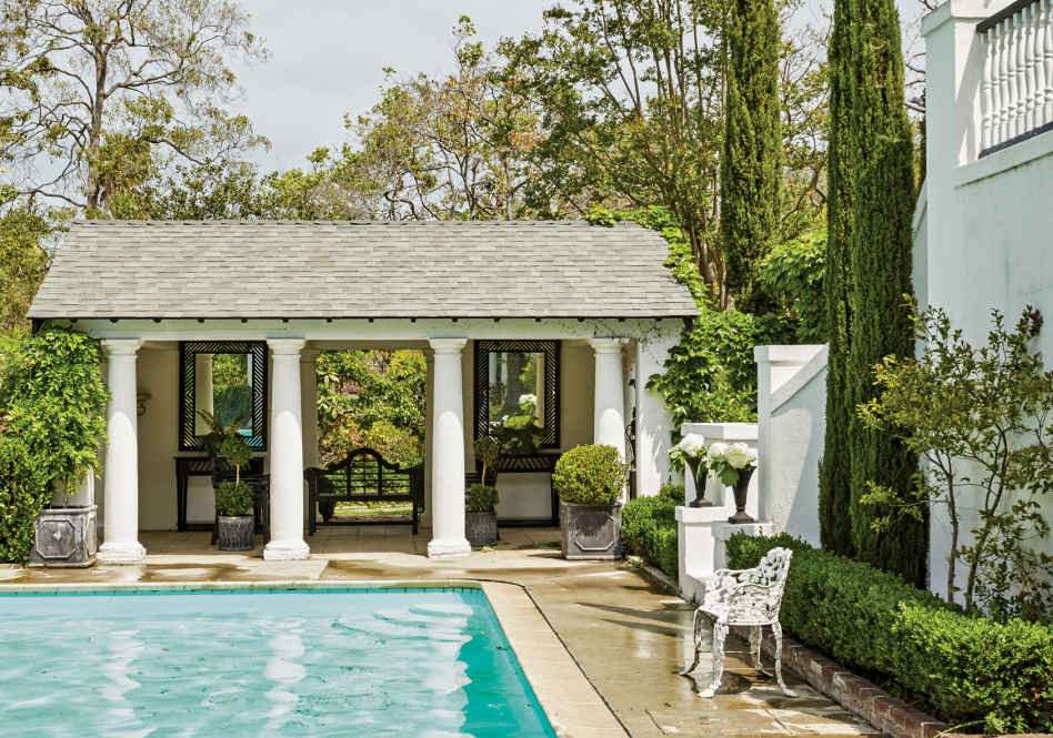 TWIN PAVILIONS. The pool is flanked by two grand, identically constructed pavilions—one formally decorated, the other (not pictured) more low-key and playful.